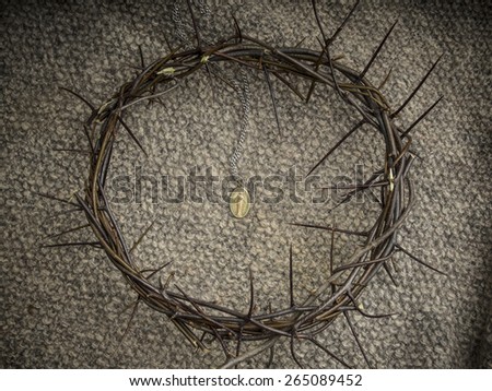 Crown of thorns on burlap background