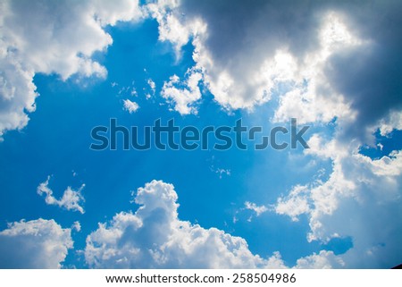Blue sky with cloud, Light of the Sun From behind the clouds,\
It\'s very beautiful