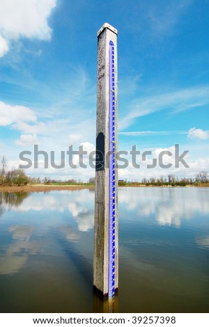 A water level measurement on a blue sky