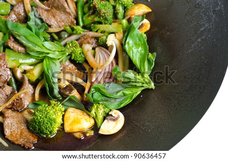 Thai basil beef in a wok pan