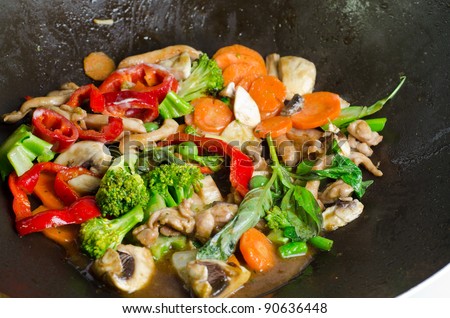 Healthy meal in a wok pan