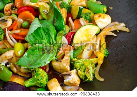 Stir-fried vegetables in a wok pan
