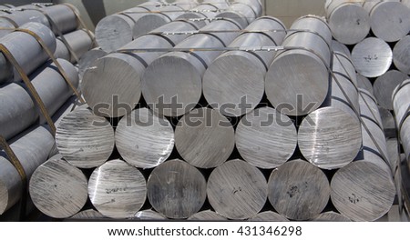 heap of aluminium bar, Aluminum ingots in outdoor stock yard of steel factory, raw material for metal automotive parts.