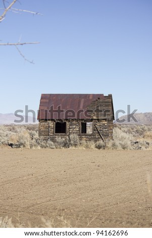 stock photo an old rusty shack in the desert