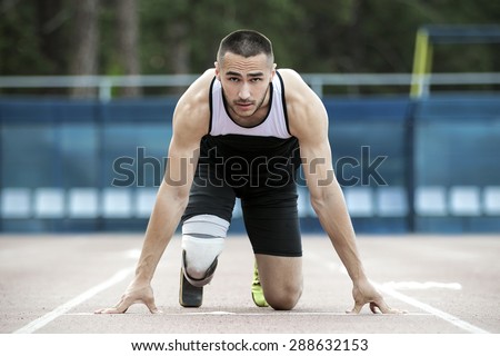 The disabled athlete preparing to start running