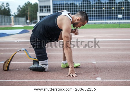 The disabled athlete preparing to start running