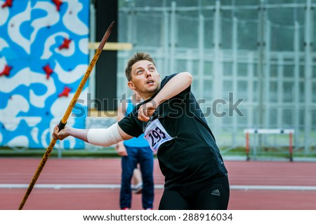 Chelyabinsk, Russia - June 10, 2015: A man athlete competing in the javelin throw during The universities championship of Chelyabinsk region in athletics
