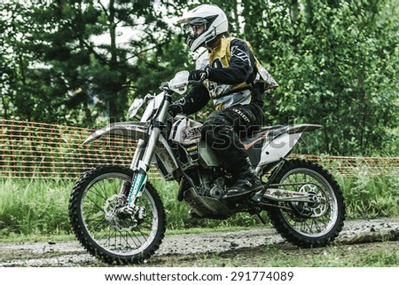 Kyshtym, Russia - June 21, 2015: A motocross driver competes during the race Urals Cup of Enduro \