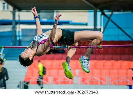 Chelyabinsk, Russia - July 24, 2015: girl athlete high jump during National competitions in memory of G. I. Nicewhen athletics, Chelyabinsk, Russia - July 24, 2015