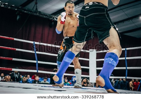 Volgograd, Russia - October 24, 2015: fighting stand-up athlete mixed martial arts during Championship of Russia on mixed martial arts