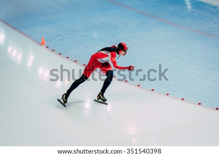 Chelyabinsk; Russia - December 3; 2015: General plan young athlete skater during race sprint distance during Cup of Russia on speed skating