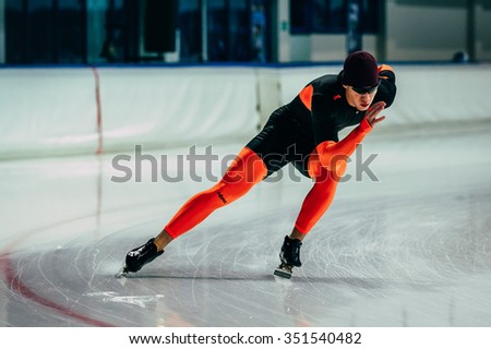 Chelyabinsk; Russia - December 3; 2015: young man athlete skater warming up before race sprint distance during Cup of Russia on speed skating