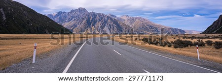 Straight empty road heading towards Mount Cook, New Zealand.