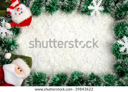 Christmas frame from a garland, snowflakes, Santa and snowman