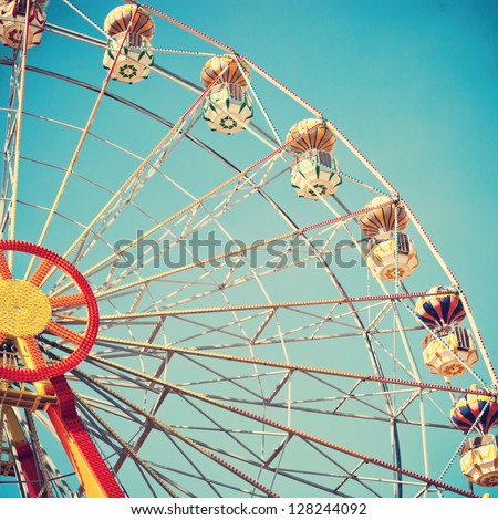 Vintage Retro Ferris Wheel On Blue Sky