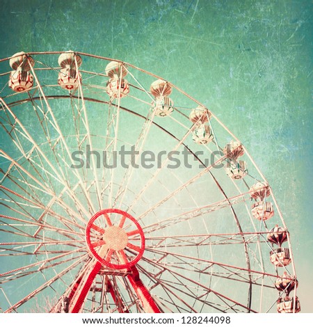 Vintage Retro Ferris Wheel on Blue Sky