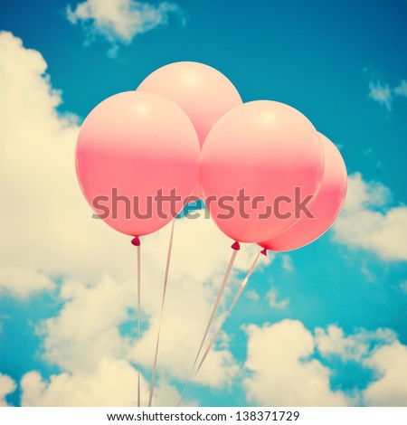 Pink Balloons on Retro Vintage Sky
