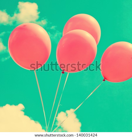 Pink Balloons on Blue Green Sky