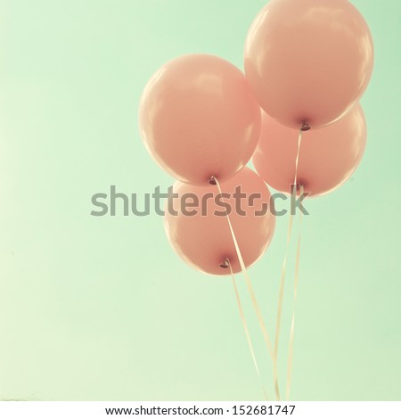 Four Vintage Pink Balloons Over Turquoise Sky