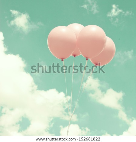 Four Vintage Pink Balloons Over Turquoise Sky