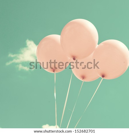 Four Pink Vintage Balloons Over Turquoise Sky