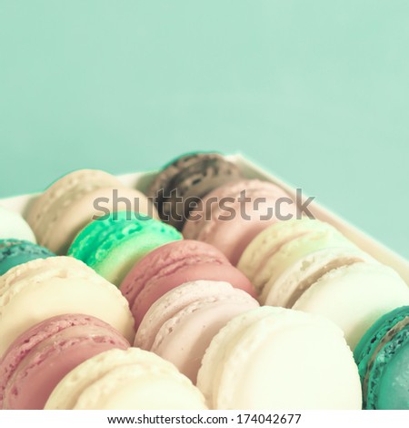 Sweet And Colourful French Macaroons On Retro-Vintage Background