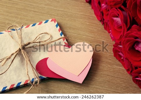 Vintage mail envelopes, roses and paper hearts