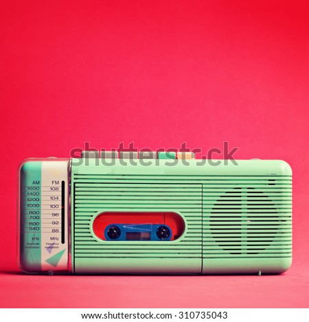 Mint retro radio over red