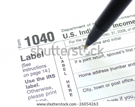 Filling federal tax forms with a pen