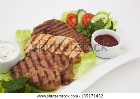 Photo of grilled meat on a plate