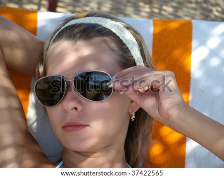 Photo of the girl in sun glasses