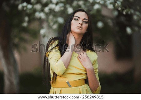 Beautiful girl in yellow dress