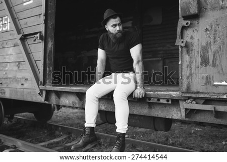 bearded man posing in the wagon train