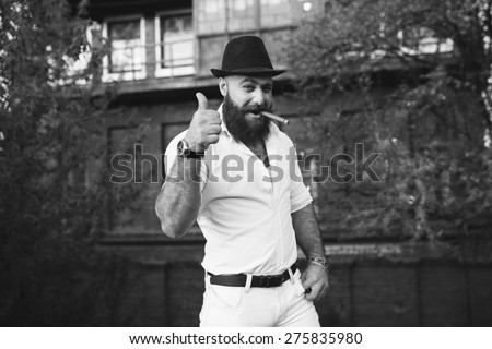 bearded italian boss smoke the cigar, black and white