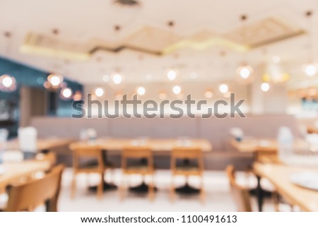 cafe restaurant interior with bokeh light abstract defocused blur background for create montage product display template
