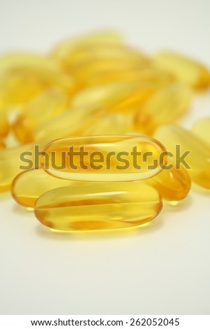 Fish Oil omega 3 soft gel capsules On White Background