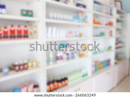 some shelves filled with over the counter medication in a pharmacy drugstore