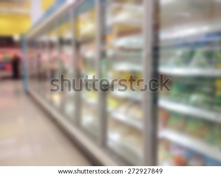 blur view of food product on refrigerator shelves in supermarket