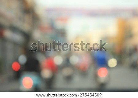 beautiful background of bokeh lights at night on road with car and motorcycle