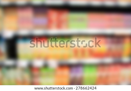 natural juice bottles beverage product on supermarket shelves