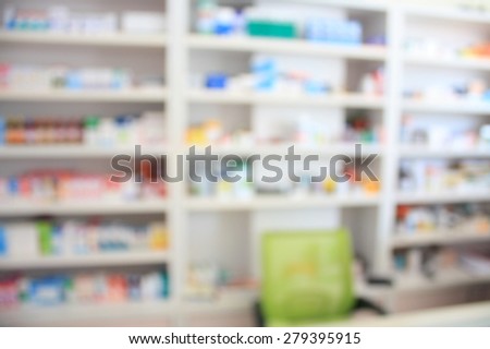 blur some shelves of drug and pharmacist chair in the pharmacy drugstore