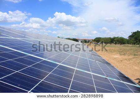 Solar panels produces green, environmental friendly energy from the setting sun