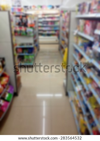 blur shelves and aisle in convenience store