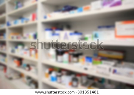 Close up of shelves of drugs in the pharmacy blurred background