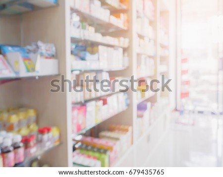pharmacy store interior with medicine, vitamin, food supplement and healthcare over the counter product on medical shelves blur drugstore for background