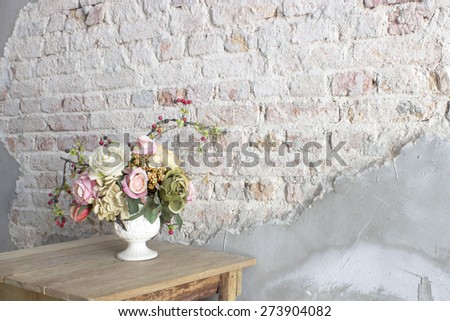Flowers and Brick Wall