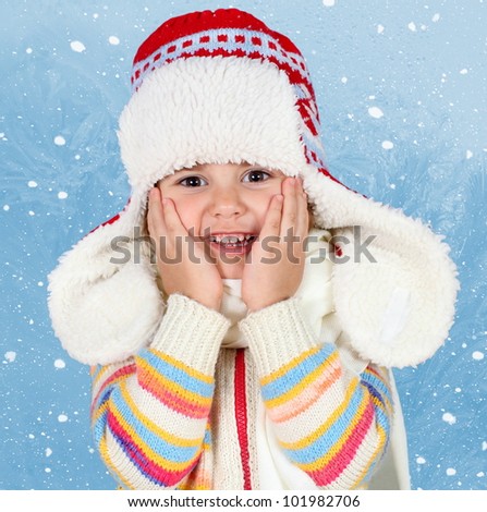 Little Child Girl in Winter Hat Smiling