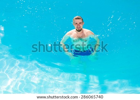man swim  in the pool
