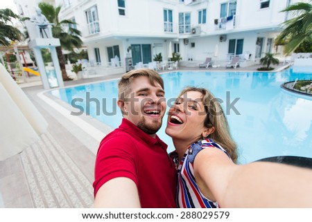 man and woman make selfie