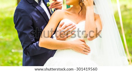 Sexy beautiful bride and her funny groom